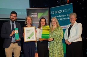 We hae meat collecting their VIBES Award for Energy Transition Scotland Award